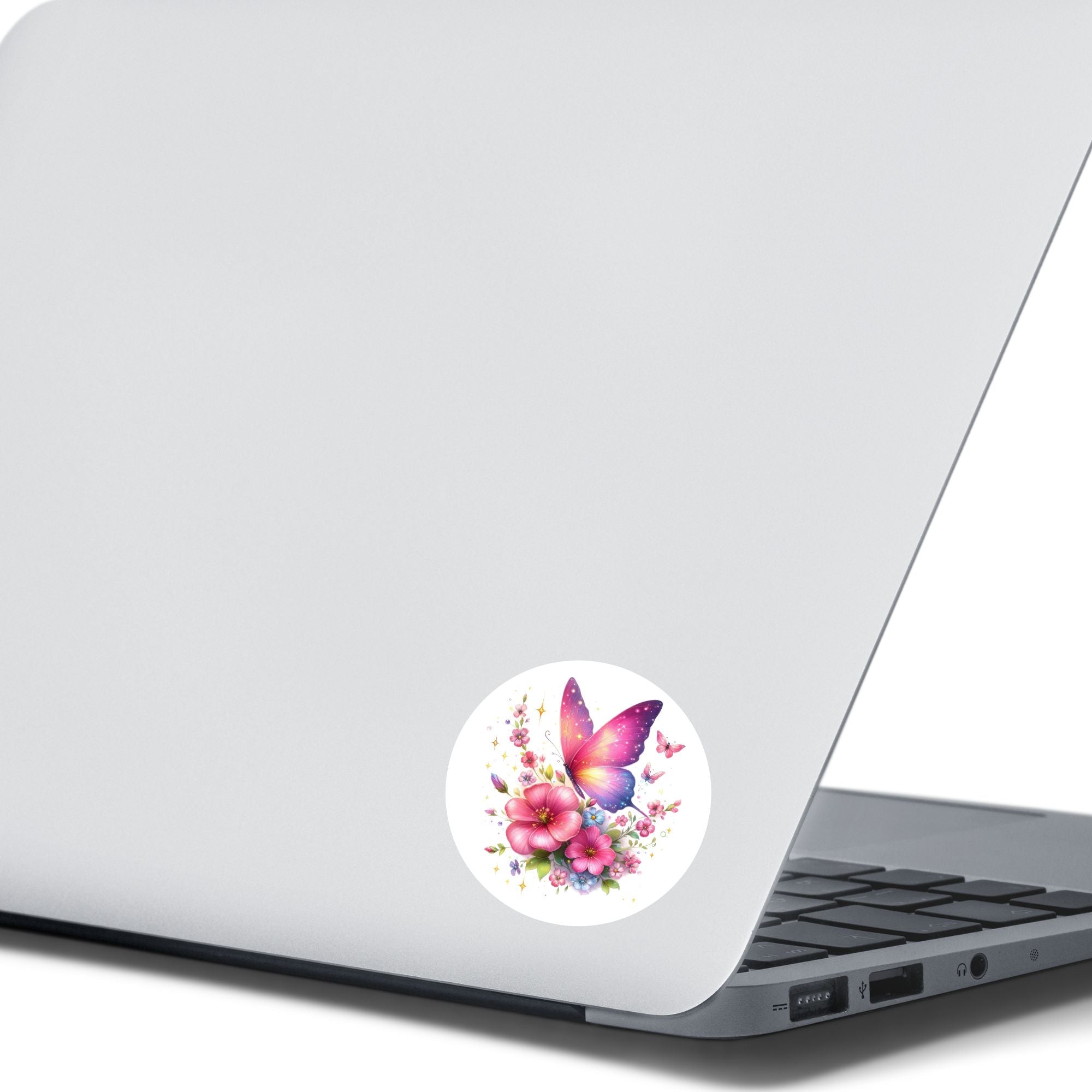 This image shows the Pink Butterfly with Stars Die-Cut Sticker on the back of an open laptop.