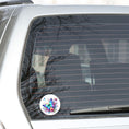 Load image into Gallery viewer, This image shows the Blue and Purple Butterfly with Stars Die-Cut Sticker on the back window of a car.
