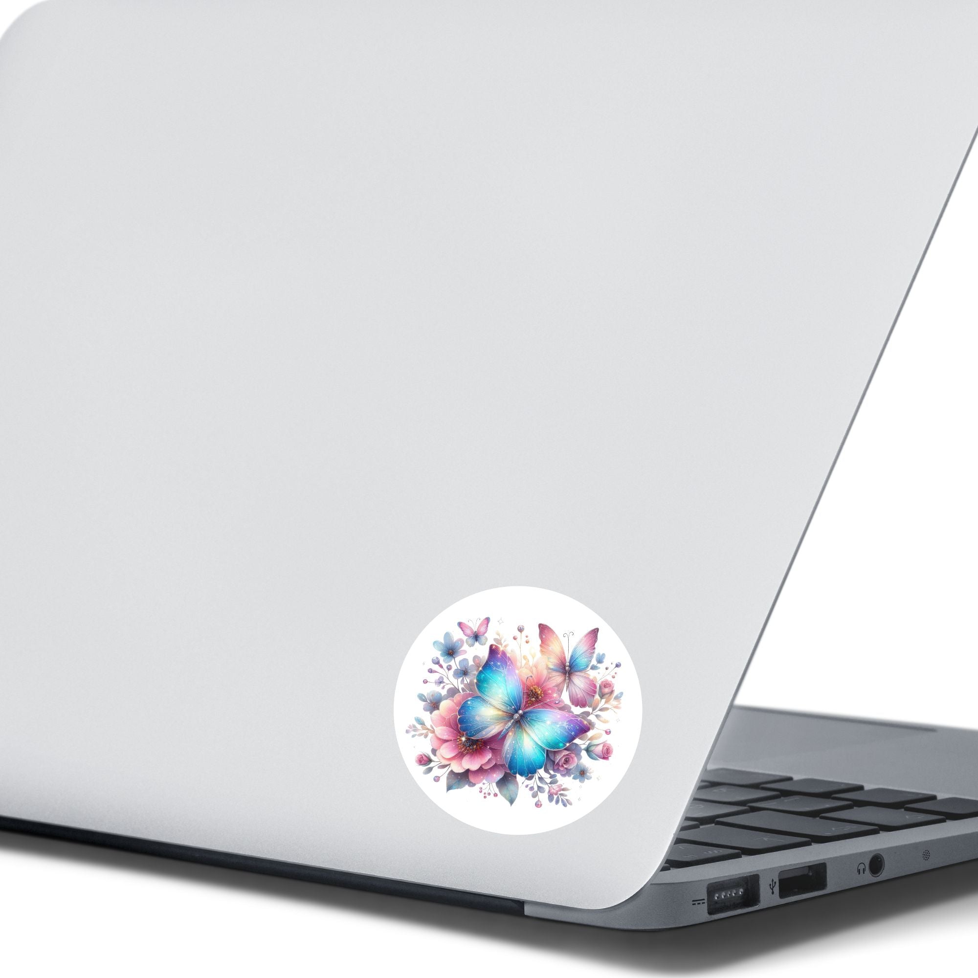 This image shows the Blue and Pink Butterfly with Stars Die-Cut Sticker on the back of an open laptop.