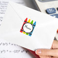 Load image into Gallery viewer, This image shows the personalized school sticker on the back of an envelope.
