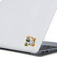 Load image into Gallery viewer, This image shows the Pirate Ship Map Die-Cut Sticker on the back of an open laptop.
