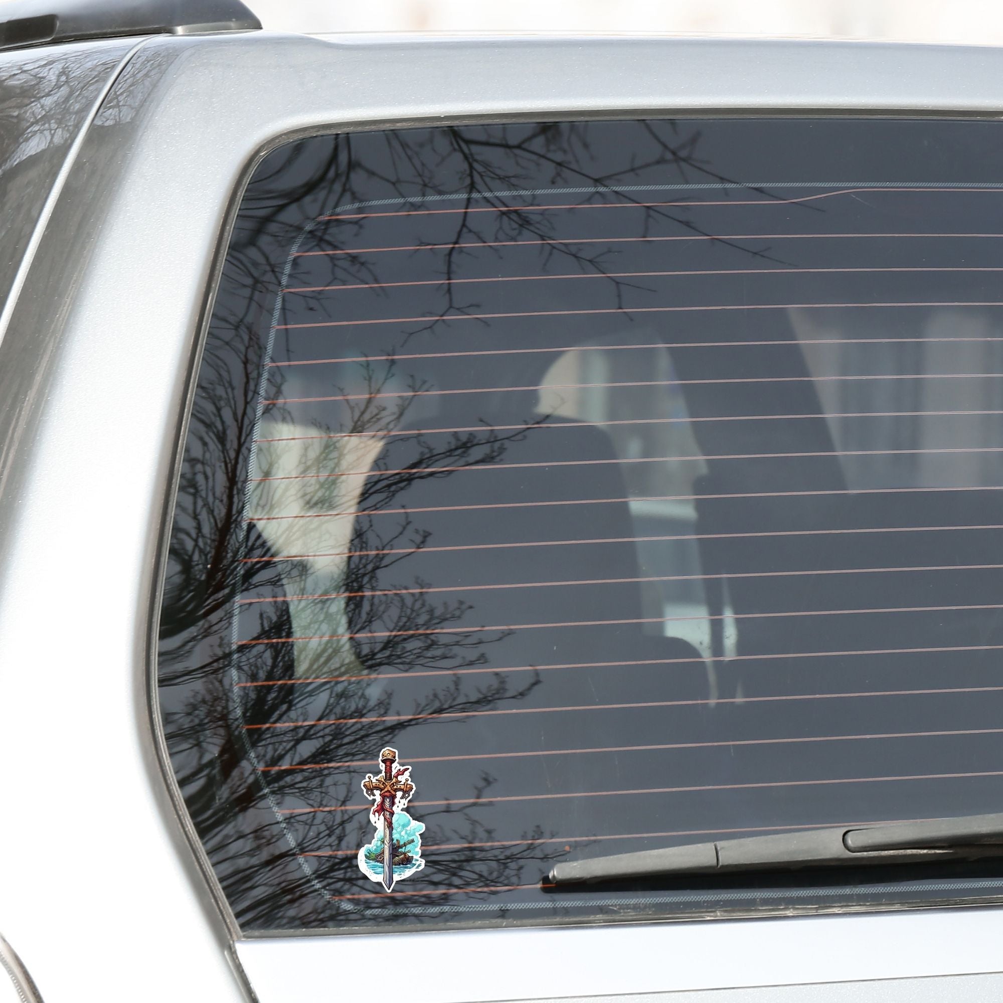 This image shows the Pirate Sword Die-Cut Sticker on the back window of a car.