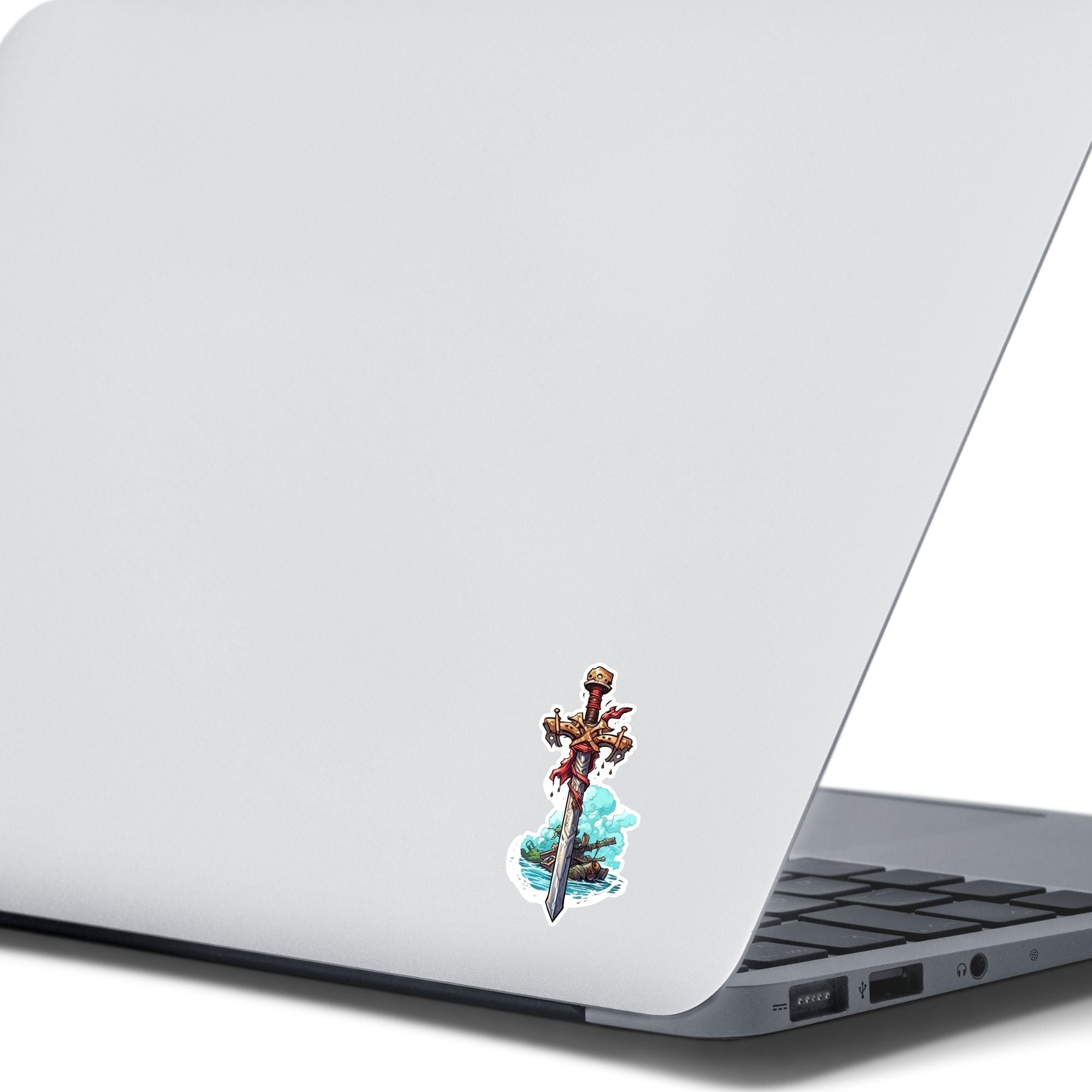 This image shows the Pirate Sword Die-Cut Sticker on the back of an open laptop.