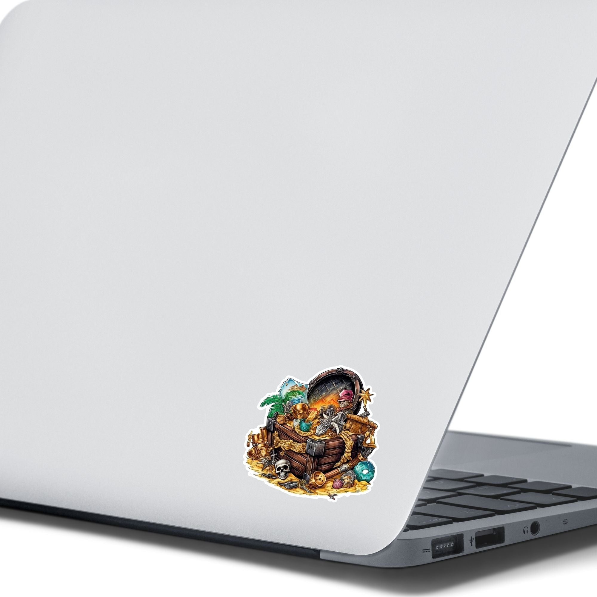 This image shows the Pirate Treasure 2 Die-Cut Sticker on the back of an open laptop.