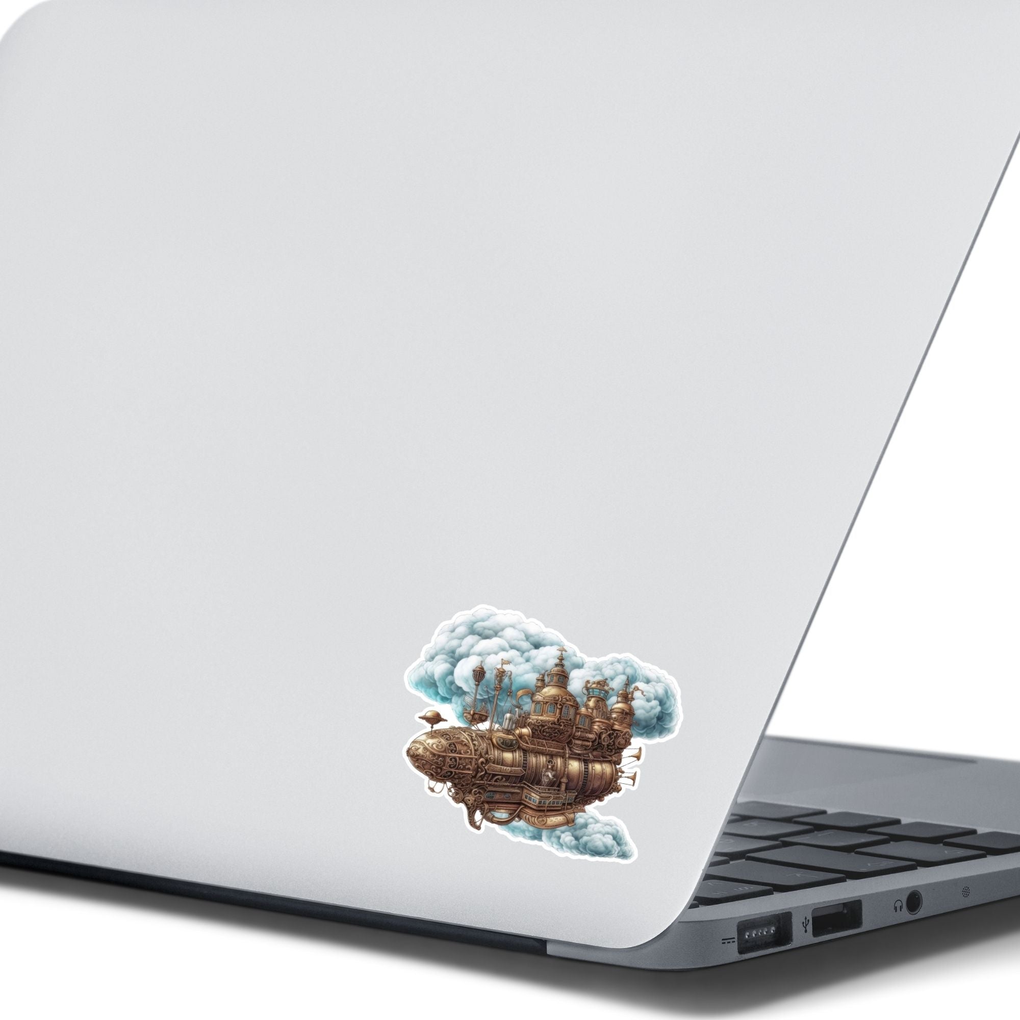 This image shows the Steampunk Airship 2 Die-Cut Sticker on the back of an open laptop.