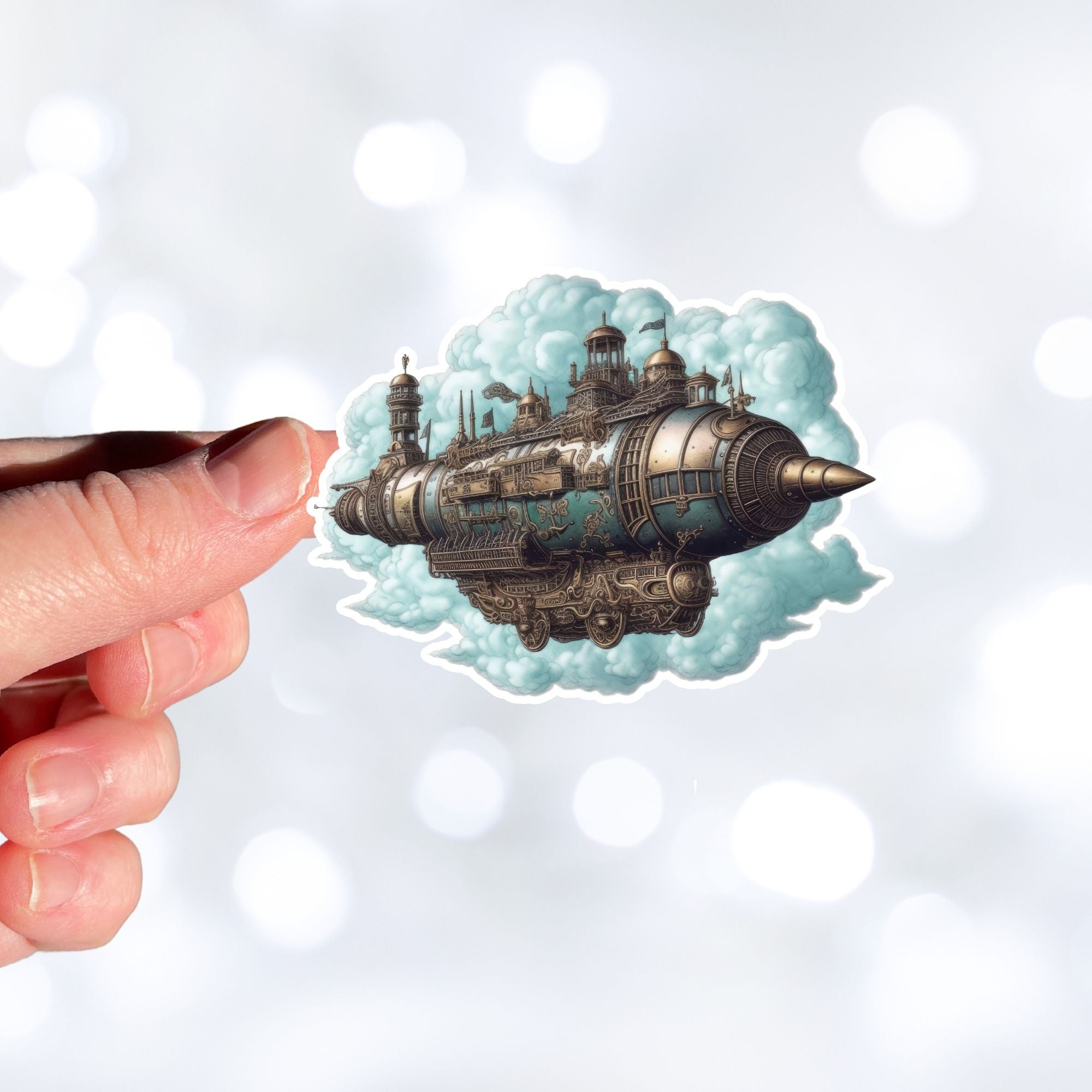 This image shows a hand holding the Steampunk Airship 4 Die-Cut Sticker.