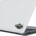 Load image into Gallery viewer, This image shows the Steampunk Airship 4 Die-Cut Sticker on the back of an open laptop.
