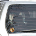 Load image into Gallery viewer, This image shows the steampunk dragon on a gear sticker on the back window of a car.

