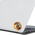 Load image into Gallery viewer, This image shows the steampunk dragon on a gear sticker on the back of an open laptop.
