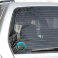 Load image into Gallery viewer, This image shows the steampunk dragon on a blue background sticker on the back window of a car.
