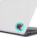Load image into Gallery viewer, This image shows a steampunk bronzed flower sticker on the back of an open laptop.
