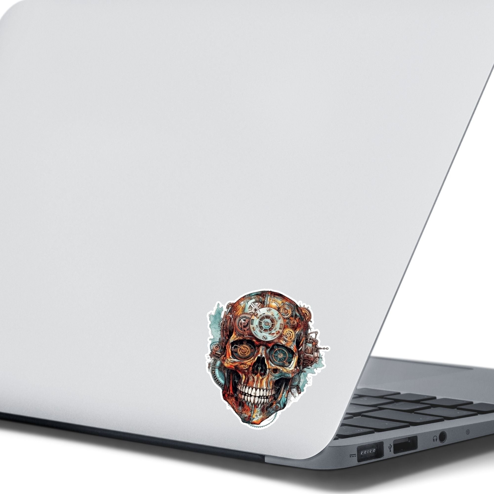 This image shows the Steampunk Skull 6 Die-Cut Sticker on the back of an open laptop.