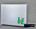 Load image into Gallery viewer, Love camping? Then show it with this camping themed love square vinyl decal! Available in 4 sizes and 10 colors, these vinyl decals make great gifts for everyone. This image shows the Camping Love Square vinyl decal on the back of an open laptop.
