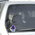 Load image into Gallery viewer, UFO alert! This individual die-cut sticker features an alien spaceship, UFO, on a black triangle background with pastel paint splatters behind. This image shows the alien triangle sticker on the rear window of a car.
