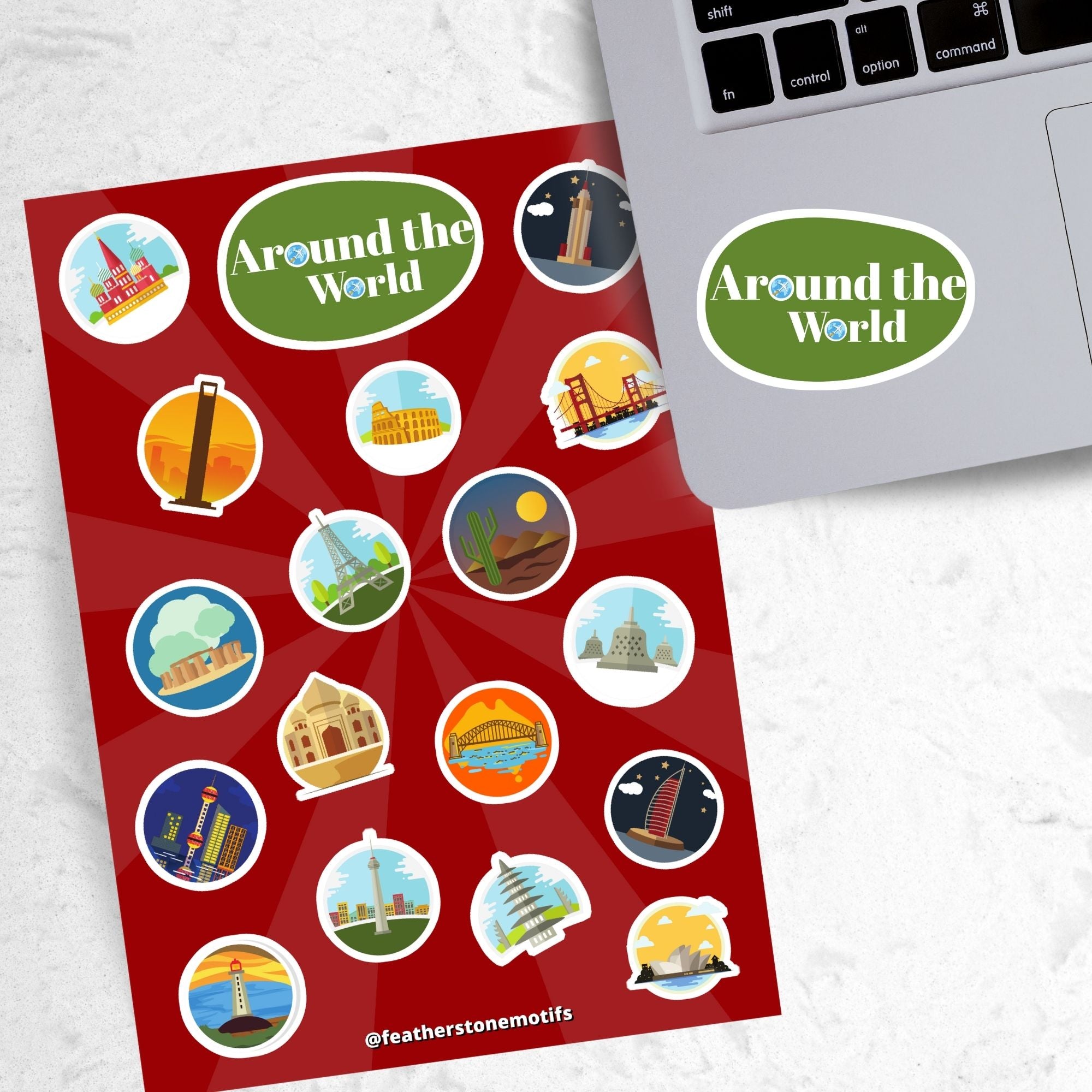 Our Around the World sticker sheet collection has sticker images of iconic travel destinations! This sheet has a red background with 18 different stickers. This image shows the sticker sheet next to an open laptop with the sticker sheet header saying "Around the World" in white on a green background applied below the keyboard.