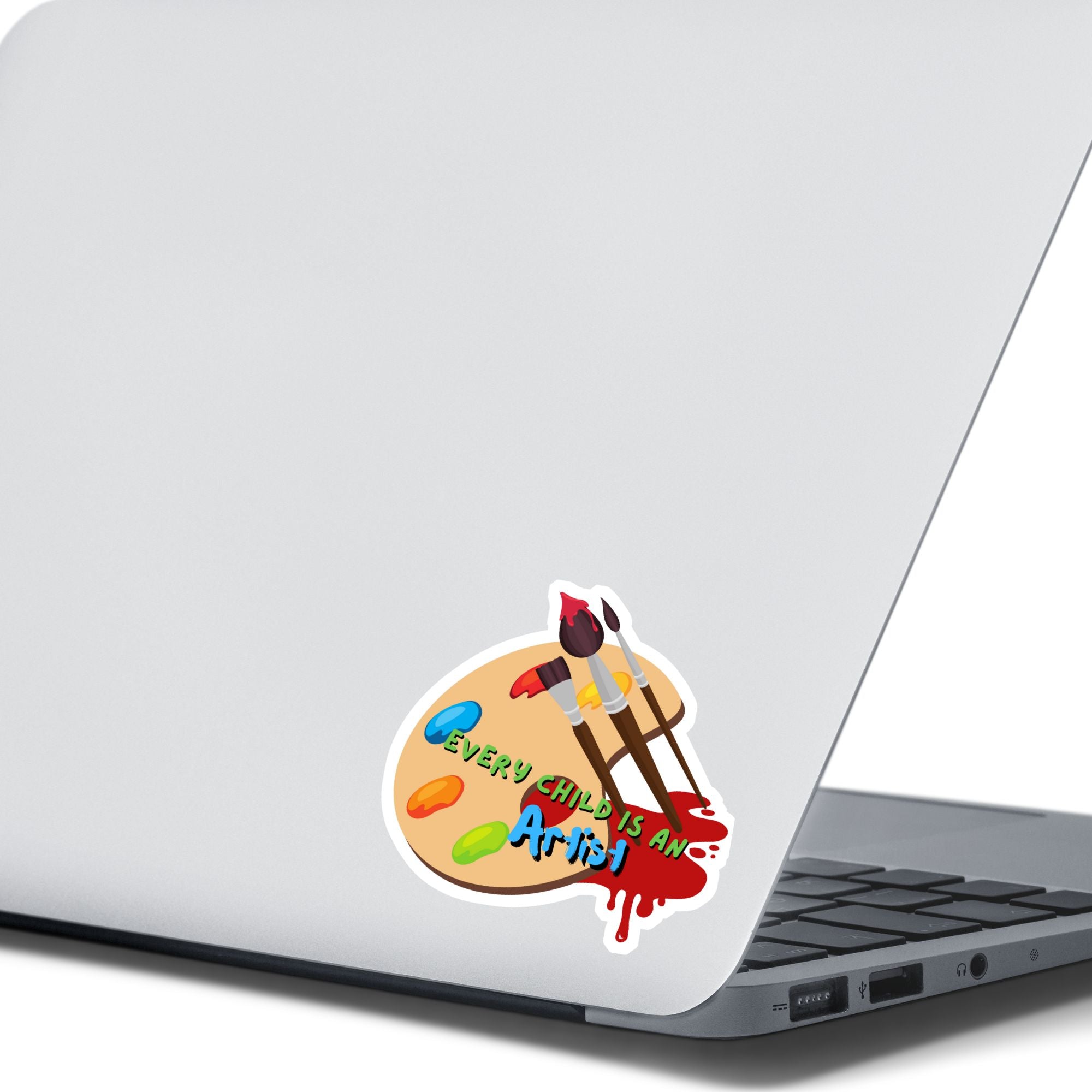 Whether for a child, or an inner child, this individual die-cut sticker is great for all artists! The Every Child is an Artist sticker has a paint palette and brushes to inspire you to create your next masterpiece. This image shows the Every Child is an Artist die-cut sticker on the back of an open laptop.
