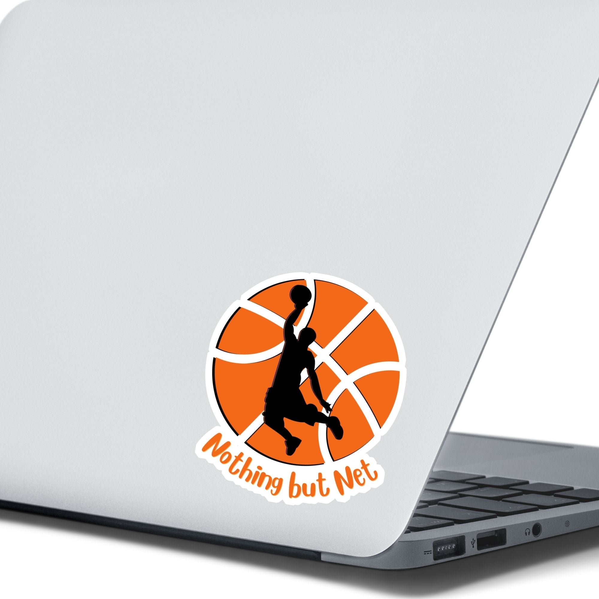 Dunk that basketball! This individual die cut sticker features a silhouette of someone about to dunk a ball, on a basketball background, with the words "Nothing but Net" at the bottom.  This image show the basketball sticker on the back of an open laptop.