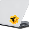 Load image into Gallery viewer, Bee Happy! This individual die-cut sticker is a great motivator. It features a honeycomb background with the silhouette of a bee and the word happy - enough said! This image shows the Bee Happy sticker on the back of an open laptop.
