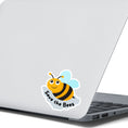 Load image into Gallery viewer, This cute individual die-cut sticker is great for anyone who appreciates our environment or just wants to smell the flowers. The Save the Bees sticker has a happy bumblebee with the saying Save the Bees below. Pair it with our Flowers, Ladybugs and Bees, or Buggin Around sticker sheets for a great gift. This image shows the Save the Bees sticker on the back of an open laptop.
