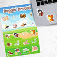 Load image into Gallery viewer, Butterflies, bees, worms, snails, and dragonfly's; this sticker sheet has cute stickers of all of your favorite bugs. This image shows the sticker sheet next to an open laptop with a ladybug sticker and a butterfly sticker applied below the keyboard.

