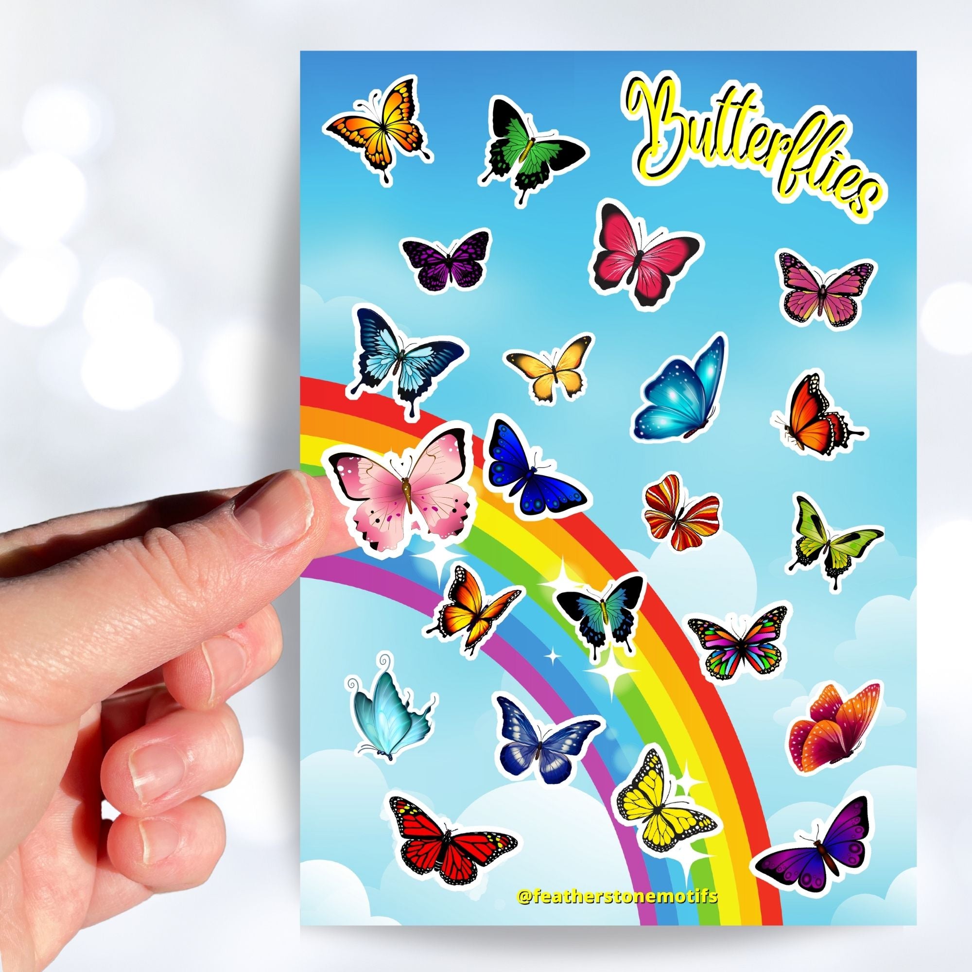 With over 20 butterfly stickers, this sticker sheet will be a sure hit with anyone who loves butterflies! This image shows a hand holding a pink butterfly above the sticker sheet.