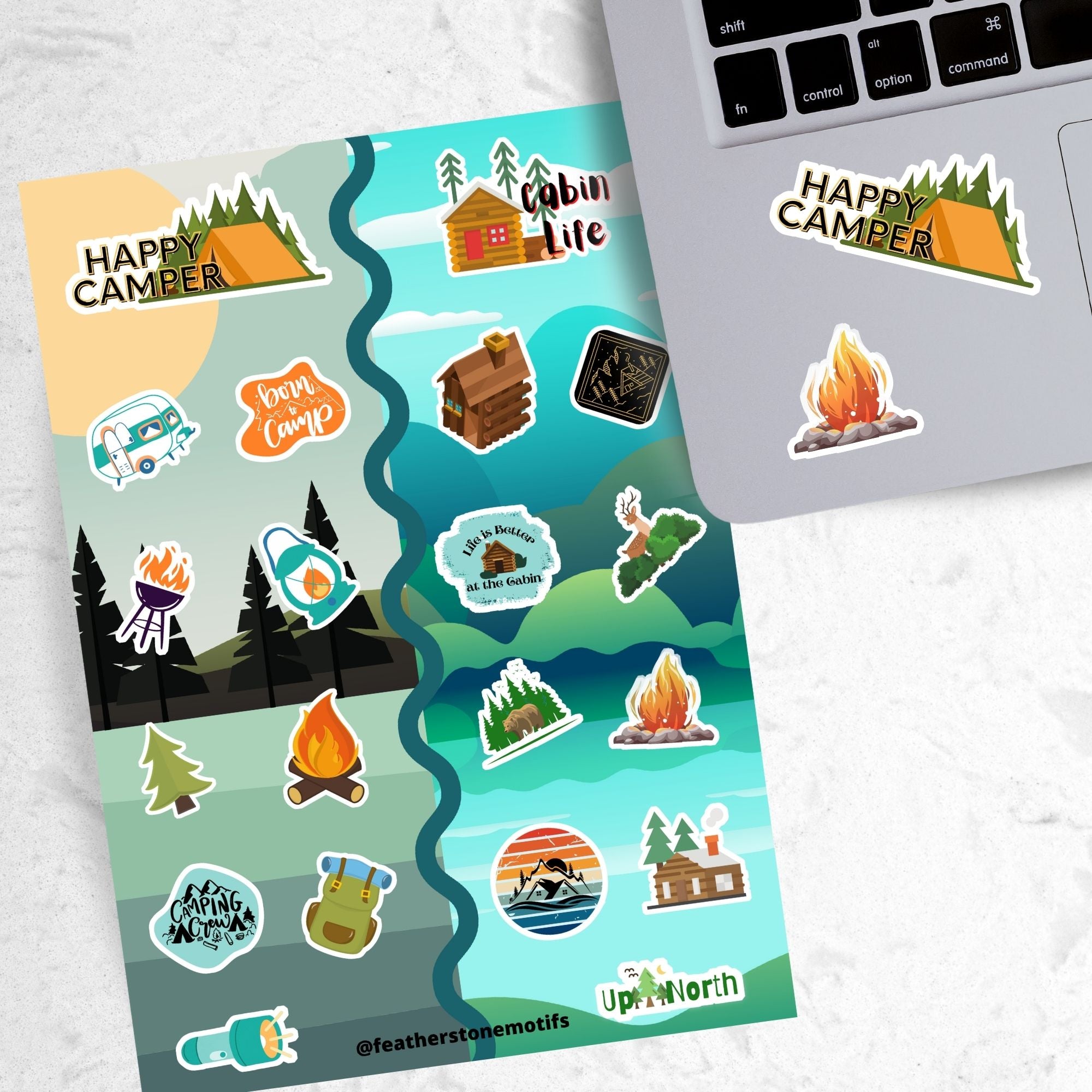 Get away to the woods, mountains, or beach with this sticker sheet! This sticker sheet has sticker images for camping in a tent or camper, or in a cabin or cottage. This image shows the sticker sheet next to an open laptop with the Happy Camper header showing a tent, and a campfire, stickers applied below the keyboard.