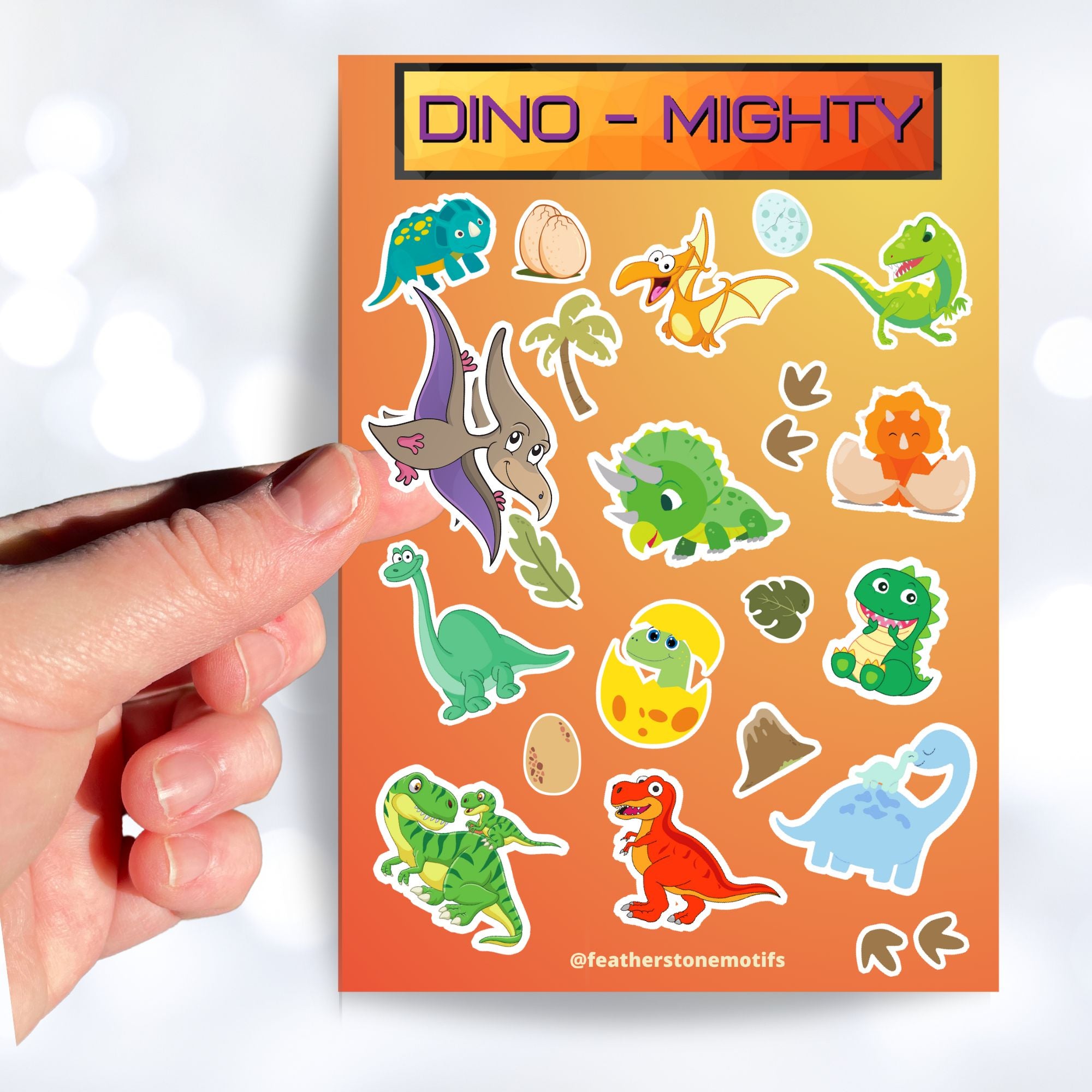 These dinosaur stickers are a-roar-able! This sticker sheet has all of your favorite dinosaurs plus dino eggs, plants, and dino footprints. This image shows a hand holding a tetradactyl sticker over the sticker sheet. 