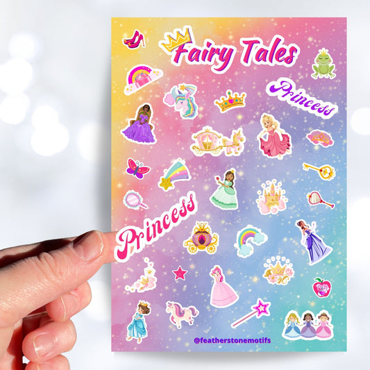 This sticker sheet is filled with stickers of princess's, rainbows, unicorns, and even a frog to kiss (will he turn into a prince?)! This image shows a hand holding a pink sticker reading "Princess" above the sticker sheet.