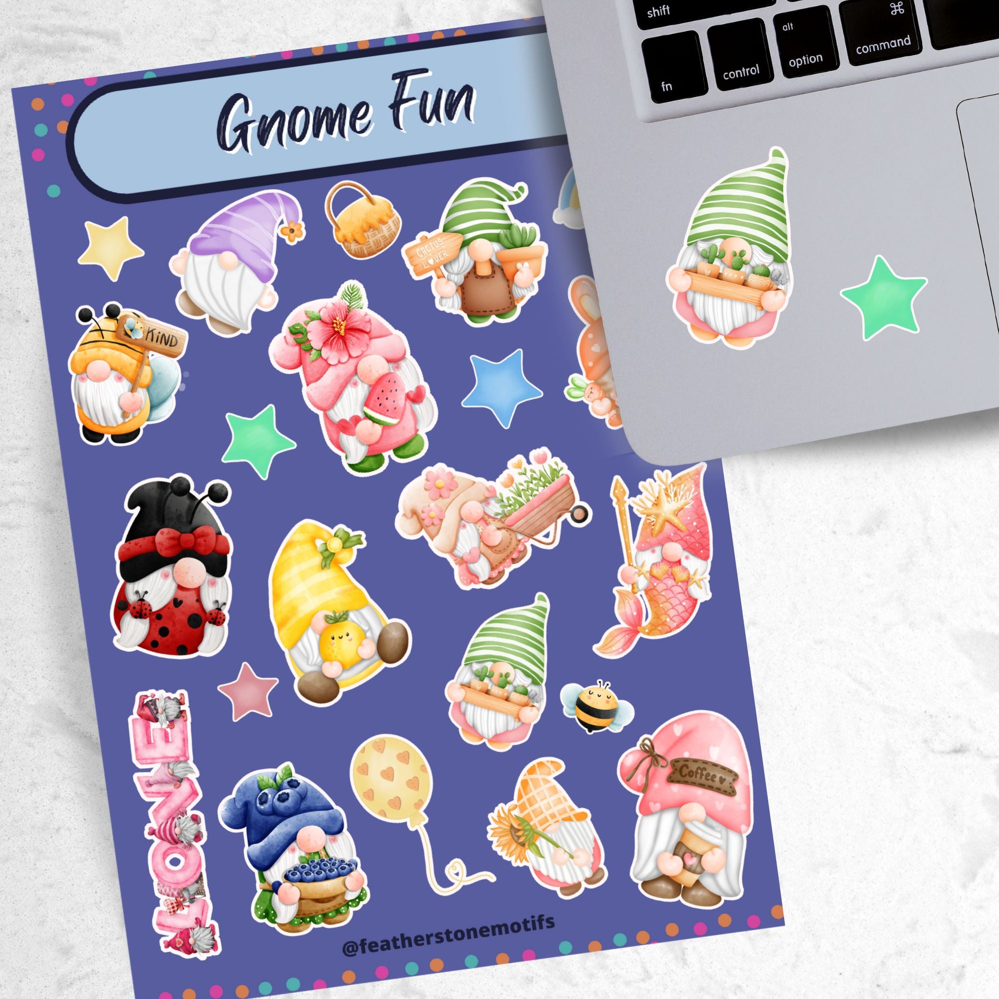 Who doesn't love gnomes? This sparkle sticker sheet features a host of gnomes along with rainbows, stars, balloons, and other sticker images. All with a sparkle holographic overlay! This image shows the Gnome Fun sticker sheet next to a laptop with two green gnome stickers applied below the keyboard.