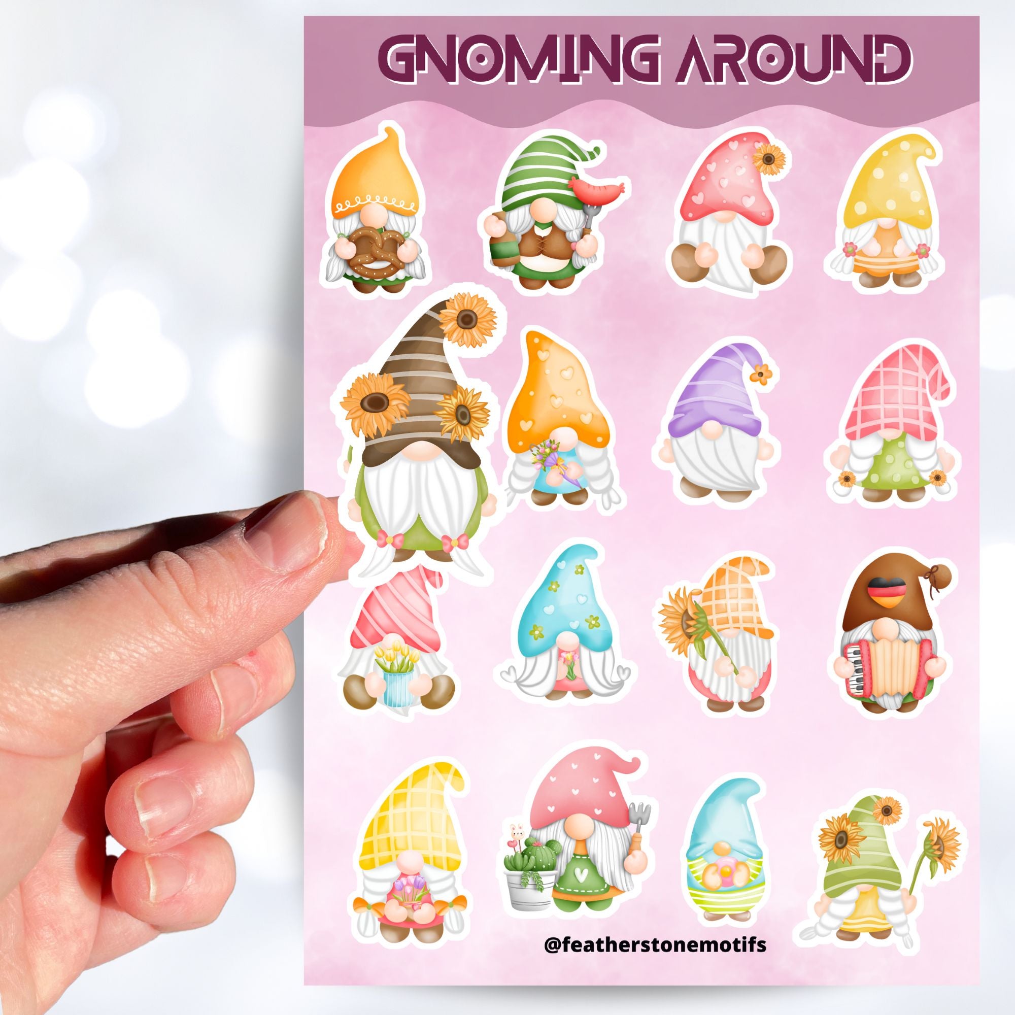 Gnomes, gnomes, and more gnomes! This sticker sheet has 16 unique gnome stickers for people who love their Gnomies. This image shows a hand holding a sticker of a gnome with sunflowers in her hair above the sticker sheet.