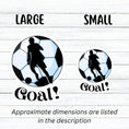 Load image into Gallery viewer, Show your love of soccer, or football, with this individual die-cut sticker! This sticker shows the silhouette of a player about to kick, on a black and white/blue soccer ball background, with the word "Goal!" below. This image shows the large and small soccer stickers next to each other.
