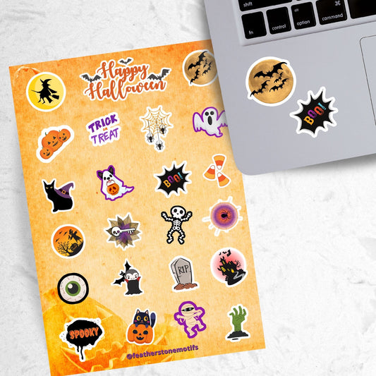 Ghosts, skeletons, black cats, and spiders; this spooky but fun sticker sheet is perfect for your Halloween decorating! This image shows the sticker sheet next to an open laptop with a sticker of bats flying in front of the moon, and a sticker that says "Boo!" on a black background applied below the keyboard.