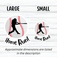Load image into Gallery viewer, Knock it out of the park! This individual die-cut sticker features the silhouette of a baseball player swinging a bat, on a background of a baseball, with the word "Homerun!" below. This image shows the large and small baseball stickers next to each other..
