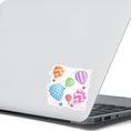 Load image into Gallery viewer, Float away on a colorful hot air balloon! This individual die-cut hot air balloon sticker has six, yes six, different hot air balloons on a background of clouds. This image shows the hot air balloon sticker on the back of an open laptop.
