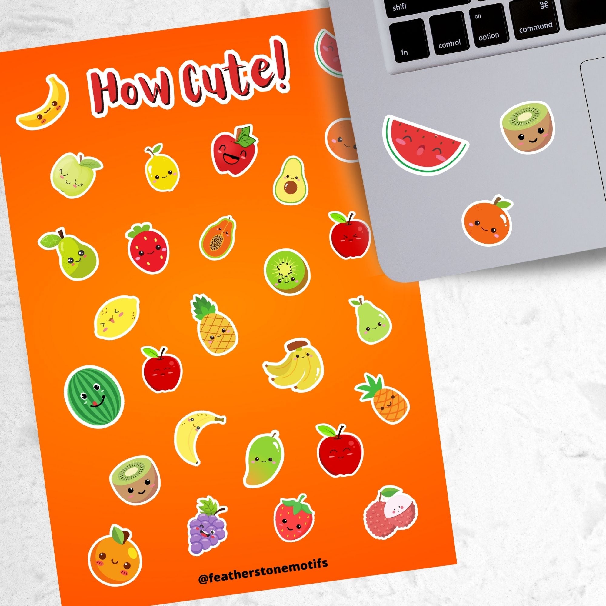 Filled with sticker images of cute fruit, this sticker sheet is sure to put a smile on anyone's face! This image shows the sticker sheet next to an open laptop with stickers of a watermelon slice, a kiwi, and an orange applied below the keyboard.