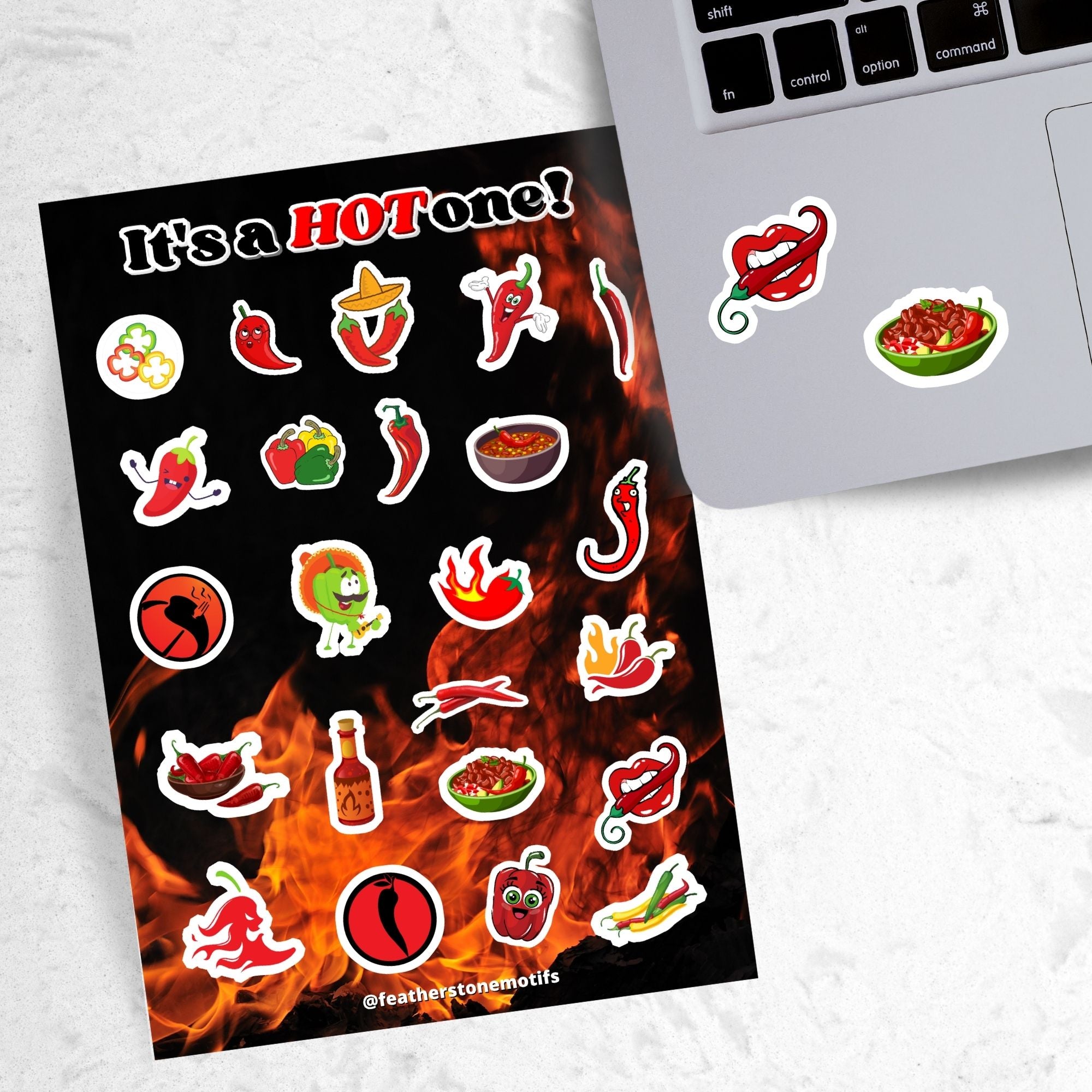 Hot peppers, hot salsa, and hot sauce; this sticker sheet is filled with stickers to celebrate everything spicy! This image shows the sticker sheet next to an open laptop with stickers of a mouth holding a pepper, and a bowl of spicy salsa, applied below the keyboard.