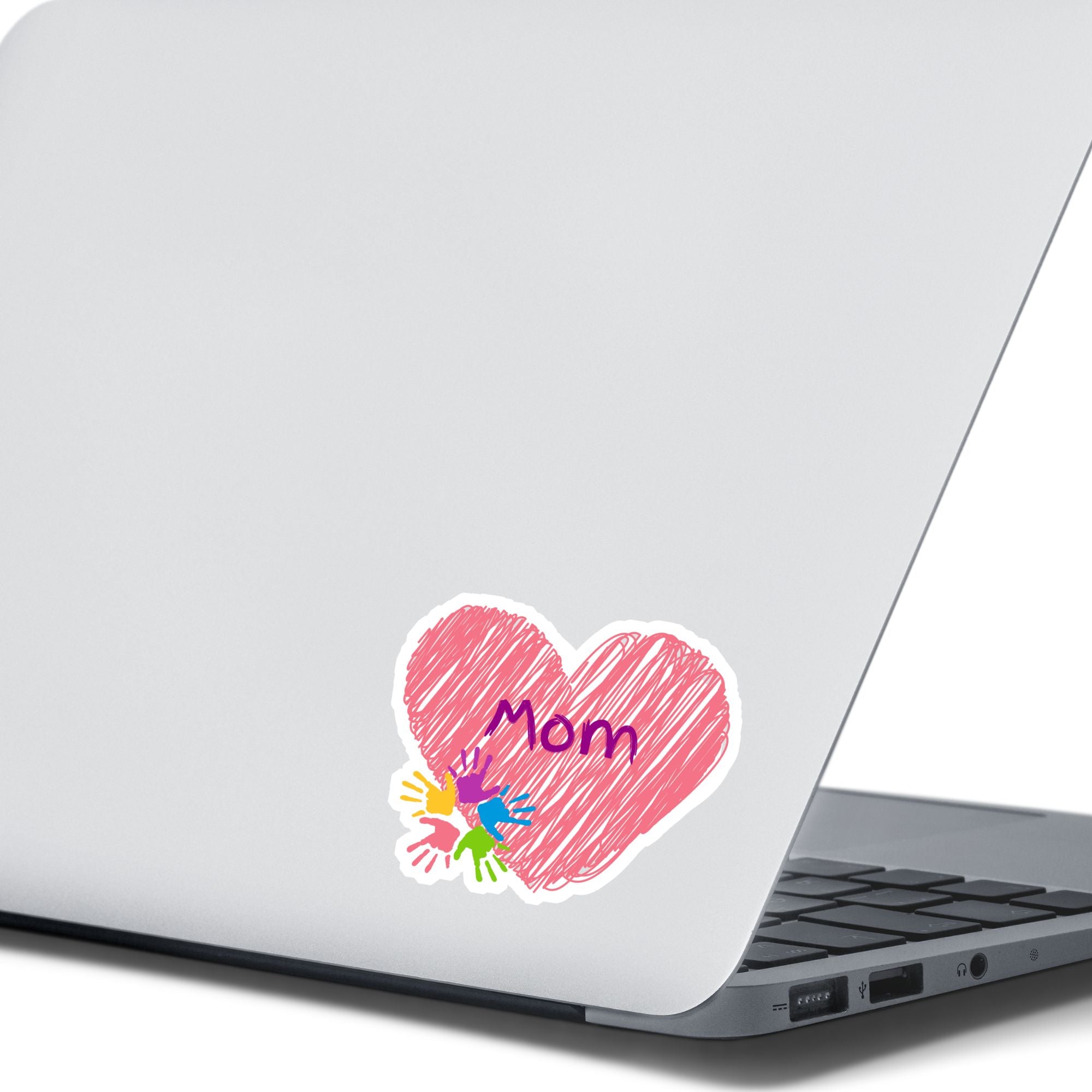 Show how much you love your mom with this individual die-cut sticker. This makes a great gift for mom, or for all mom's to proudly show they are a mother! This sticker features a pink scribbled heart with Mom written across the middle and 5 small paint hands on the lower left side. This image shows the Mom sticker on the back of an open laptop.