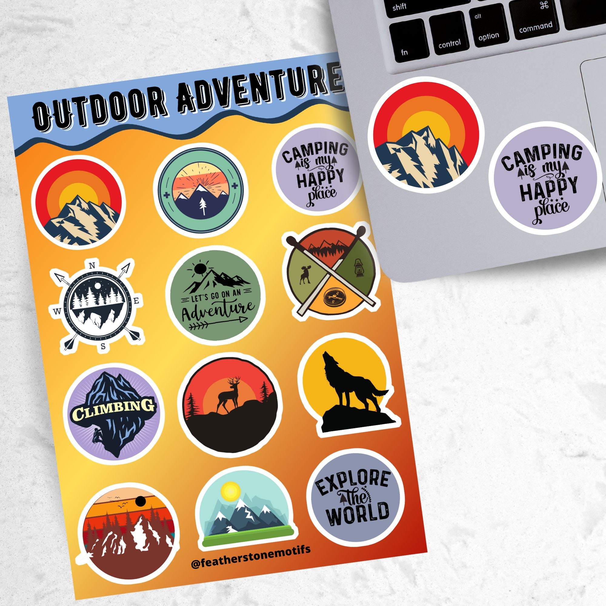 Tie up your boots and enter the wild with this sticker sheet! This sticker sheet has twelve different stickers showing different outdoor activities. From the mountains to camping to climbing this set is perfect for any outdoors person. This image shows the sticker sheet next to an open laptop with stickers of a mountain and one that says "Camping is my happy place"