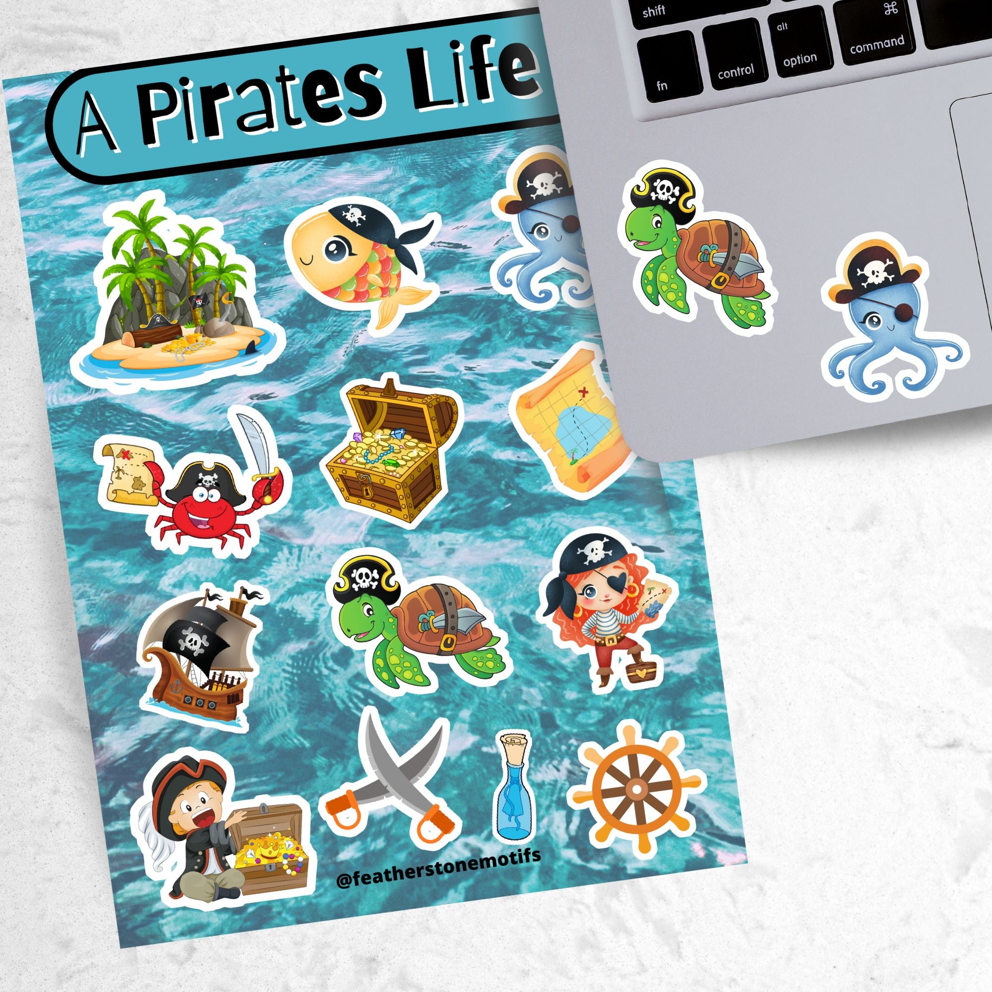 You'll walk the plank to get our A Pirates Life sticker sheet with individual stickers of treasure chests, treasure maps, pirate ships, pirates, and pirate creatures.  This is an image of a laptop with stickers on it.