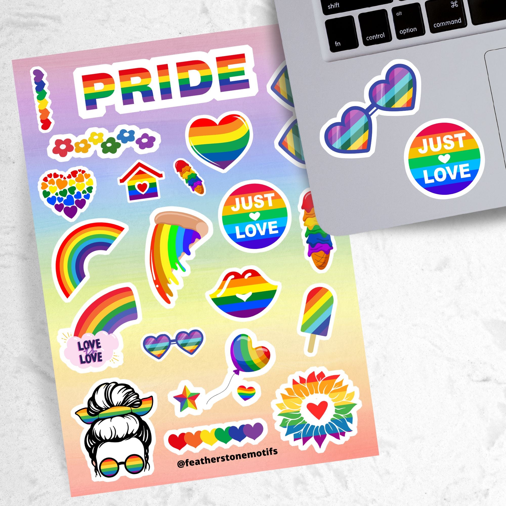 Show your LGBTQ Pride with this sticker sheet! This sticker sheet is filled with rainbow Pride images that are perfect for anywhere you want to show your Pride. This image is of the sticker sheet next to an open laptop with a sticker of heart rainbow glasses and an sticker saying Just Love applied below the keyboard.