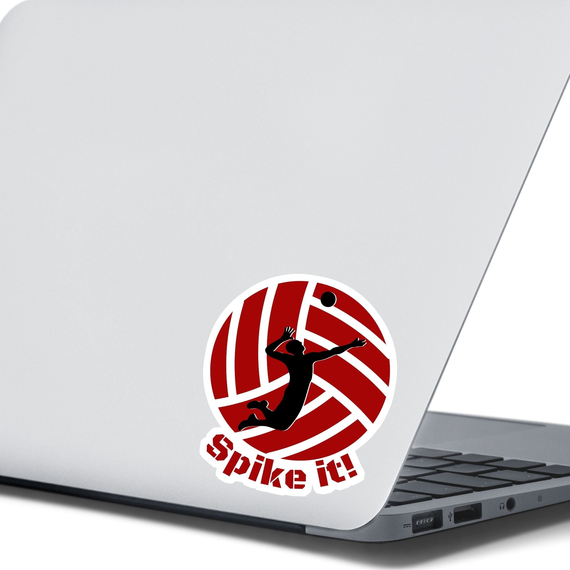 Show your love of volleyball with this individual die-cut sticker! This sticker shows the silhouette of a player about to spike the ball, on a maroon and white volleyball background, with the words "Spike it!" below. This image shows the volleyball sticker on the back of an open laptop.
