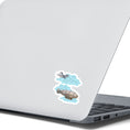 Load image into Gallery viewer, Is it a battle in the sky or is the plane coming to help out the blimp? This individual die-cut steampunk sticker features a steampunk plane diving through the clouds towards a steampunk dirigible. This image shows the steampunk flyers sticker on the back of an open laptop.
