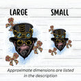 Load image into Gallery viewer, Steampunk Monkey has his own version of a steampunk hat and goggles, plus he is wearing goggles and surrounded by three steampunk butterflies. All on a blue and white background. This image shows the large and small steampunk monkey stickers side by side.
