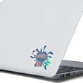 Load image into Gallery viewer, Ahoy Matey! This steampunk submarine sticker has a steampunk and a pirate theme. It features a steampunk submarine with a pirate flag on a blue background with coral and underwater plants. This image shows the steampunk submarine sticker on the back of an open laptop.
