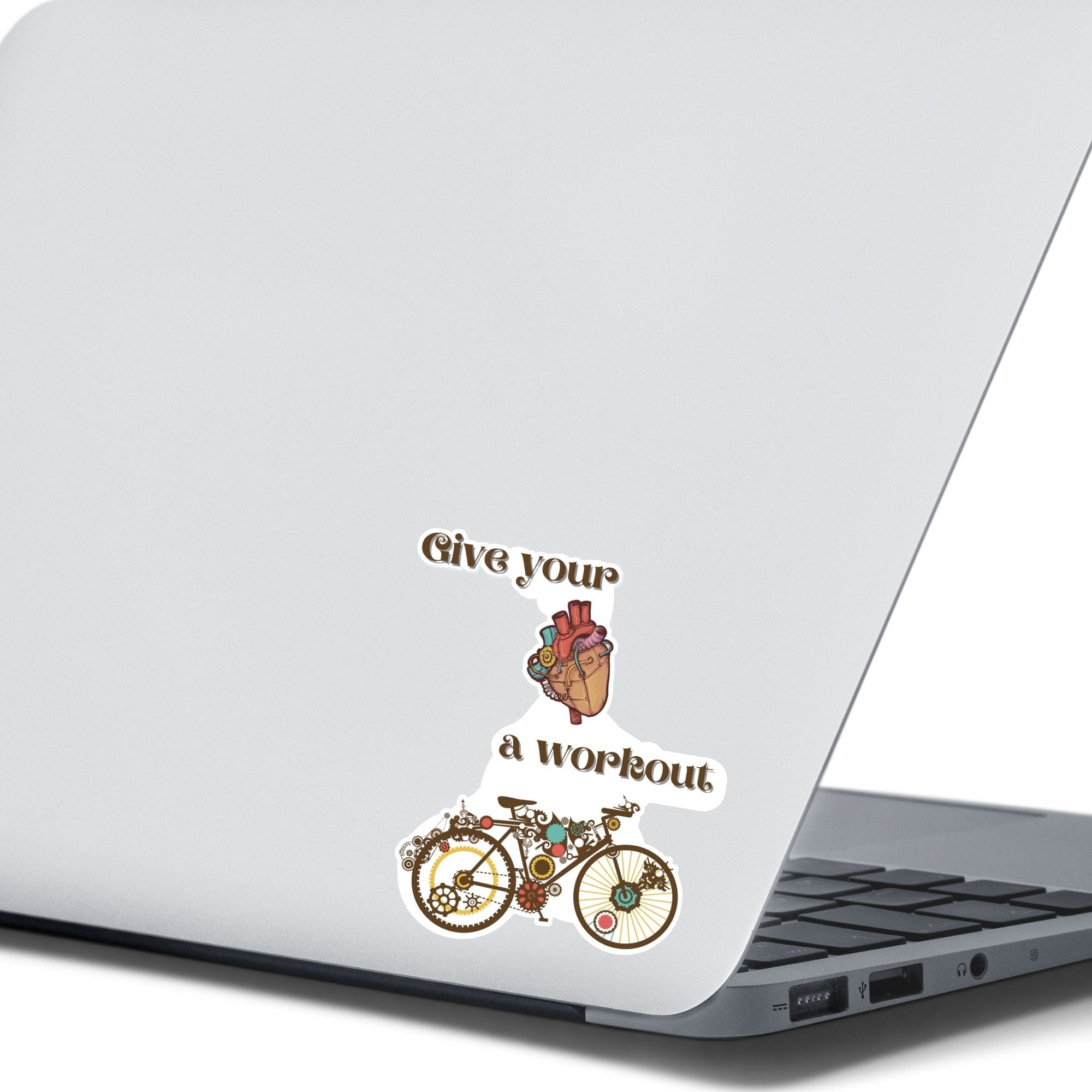 Give your heart a workout! This steampunk sticker has a steampunk anatomic heart and a steampunk bicycle. This image shows the steampunk bicycle sticker on the back of an open laptop.