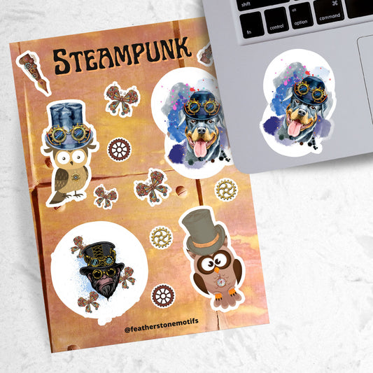 This Steampunk sticker sheet features four large animal stickers: Mr. and Mrs. Owl, Steampunk Monkey, and Steampunk Rotty (Rottweiler) along with smaller miscellaneous gear, butterfly, and pen stickers.  This image shows the sticker sheet next to an open laptop with the Steampunk Rotty sticker applied below the keyboard. The steampunk Rotty sticker is a Rottweiler  wearing a steampunk hat with goggles and a pastel background..