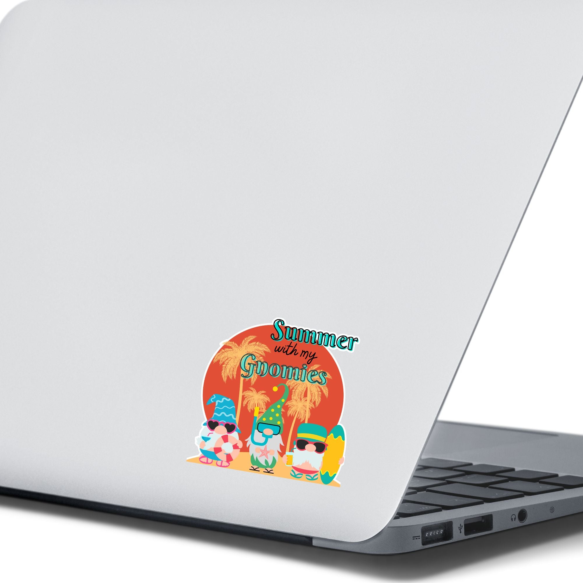 Who doesn't want to chill with their gnomies in the summer? This individual die-cut sticker features three gnome friends who are ready for the beach. They're standing in front of a setting sun silhouetting palm trees. Enjoy! This image shows the Summer with my Gnomies sticker on the back of an open laptop.