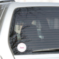 Load image into Gallery viewer, This round individual die-cut sticker is Sweet! It features the word Sweet in the center surrounded by pink and purple circular dots. This makes a great gift for anyone you're sweet on! This image shows the Sweet sticker on the back window of a car.
