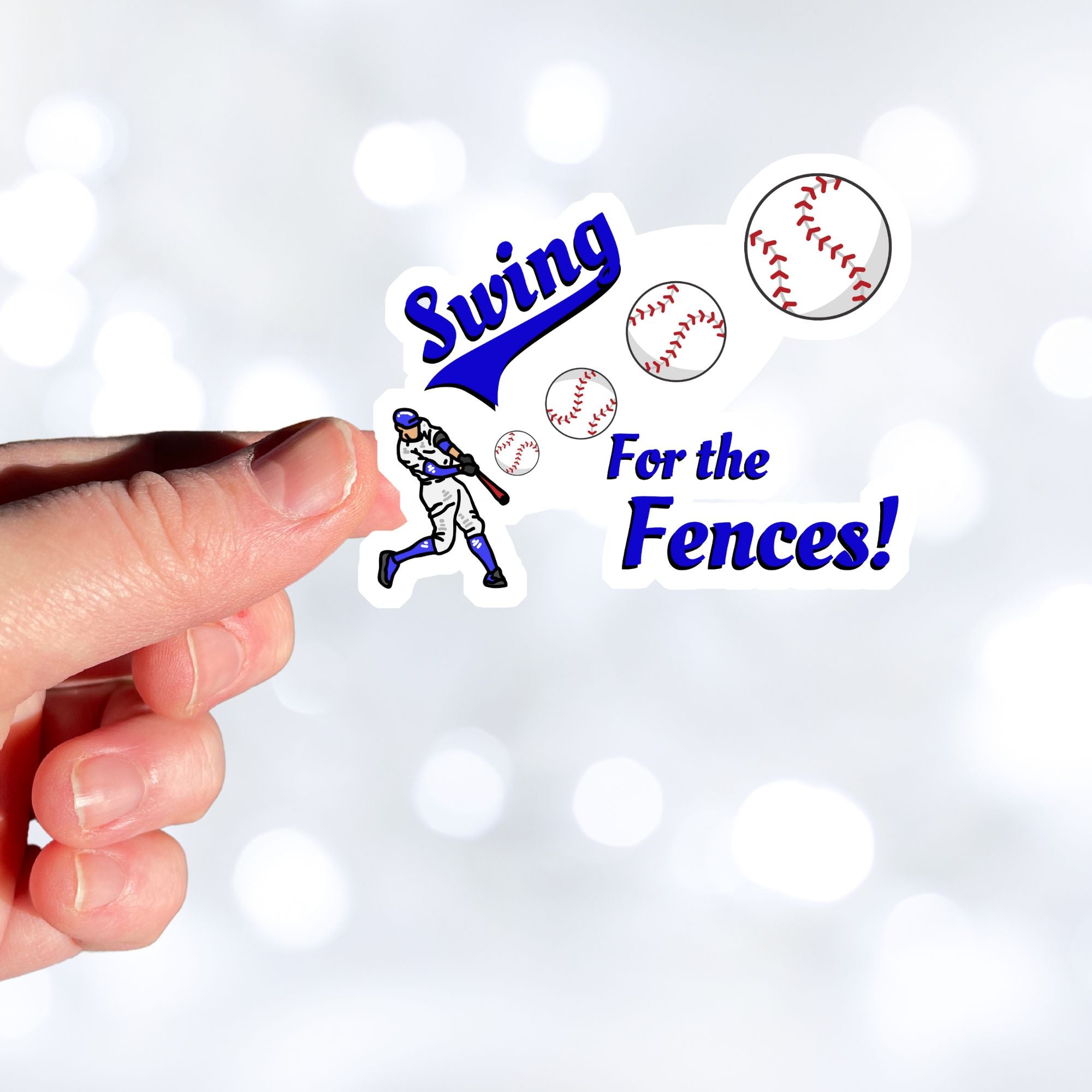 Swing for the Fences! - good for baseball and softball, but also as a metaphor for living our lives! This individual die-cut sticker features a ball player hitting a ball as it moves out towards us with the words Swing for the Fences. Check out our Inspirational collection for more inspiring stickers!  This image shows a hand holding the Swing for the Fences! sticker