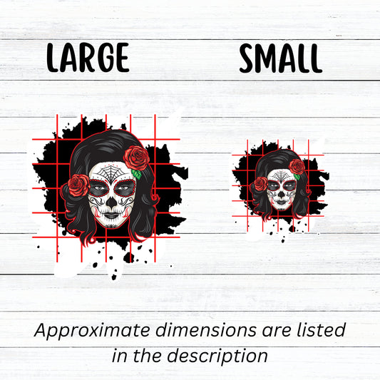Trash Polka uses red, black, and white with a combination of abstract, surrealistic, and realistic images, and this individual die-cut sticker features a sugar skull woman with roses in her hair on a black background with a red grid. This image shows large and small trash polka sugar skull stickers next to each other.